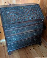 Front view showing carvings and overall form