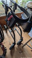 Nexus rollator walker, four wheels, folding frame visible