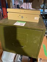 Cabinet and cash box together on shelf