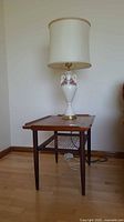 Lamp on table showing full view of both items together
