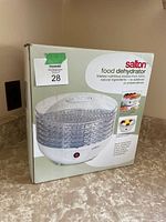 Box front showing Salton food dehydrator image and branding