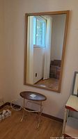 Mirror and side table together for scale and context