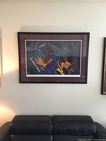 Full view of framed print on wall