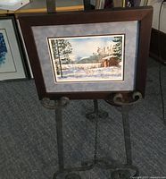 Full view of framed print on easel showing artwork, mat and frame