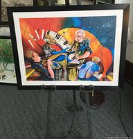 Front view of framed Marcus Glenn lithograph on easel