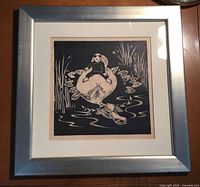 Front view of framed woodblock print showing entire frame, mat and image