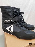 Side view of right boot on box