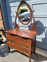 Full view of dresser and mirror