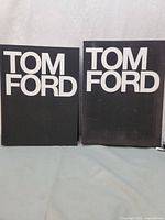 Front view of book and slipcase side by side