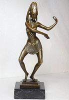 Full view of bronze dancer on marble base