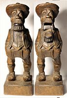 Front view of carved wood figural nutcracker