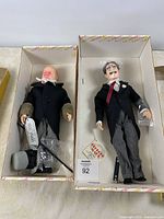Both Effanbee celebrity dolls in original boxes side by side