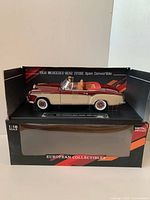 Front view of die-cast 1958 Mercedes-Benz 220SE model in box