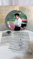 Front view of Elvis Presley collector plate with original box and paperwork
