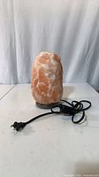 Full view of Himalayan salt lamp with cord