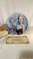 Front view of Marilyn Monroe porcelain plate with box and COA