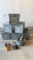 overall lot showing six bins, pruners, screwdrivers, mortar & pestle