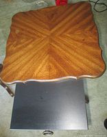 Perspective view of tabletop with slide partially extended