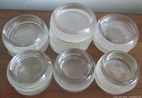 Six coasters shown top and side view highlighting thickness and clarity