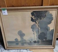 Framed Alexandre Jacob print leaning against wall