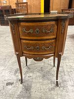 Full view of demilune table front showing drawers, legs and overall condition