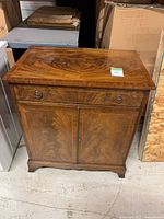 Front view closed showing veneer and inlay