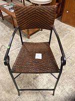 Front view of woven rattan chair