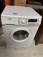 Front view of AEG Lavamat washer showing control panel and door
