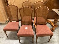 front view of all five cane-back chairs