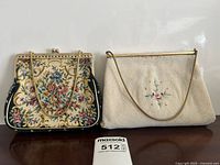 Both clutch purses front view