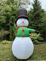 Front view of fully inflated snowman showing colors and condition