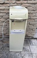 Full front view of GE water dispenser showing overall condition