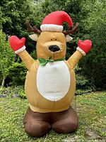 Full view of inflated 8 ft reindeer outdoors