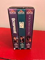 Three VHS tapes in slipcase showing spines Octopussy, 007, For Your Eyes Only