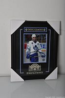 Full view of framed autographed Doug Gilmour display with protective corner covers