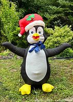 Front view of fully inflated penguin showing overall appearance and condition