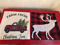 Both pillow covers laid out showing full designs