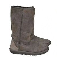 Side view of both boots showing suede uppers, overall wear and sole profile