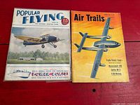 Both magazine covers side by side for identification