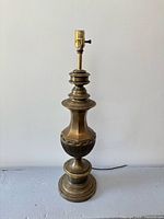 Full view of brass table lamp without bulb