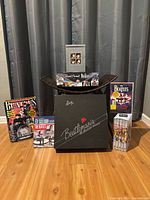 Group shot showing board games, magazines and DVD sets