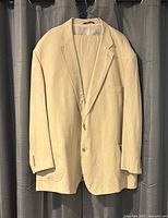Front view of light tan Oak Hill single-breasted suit jacket
