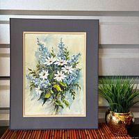 Frontal view of matted watercolor print