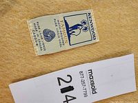 Kenwood label showing brand and wool content