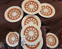 All eight plates arranged to show full pattern