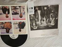 Outer sleeve front with band portrait and partial inner sleeve visible