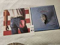 Front covers of both album jackets
