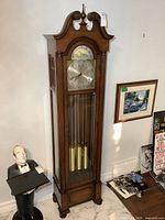 Full view of grandfather clock showing entire case and height