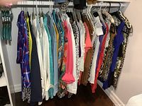 Full rack showing quantity and variety of blouses