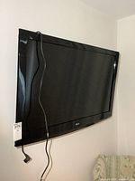 Front view of wall-mounted LG 42-inch TV